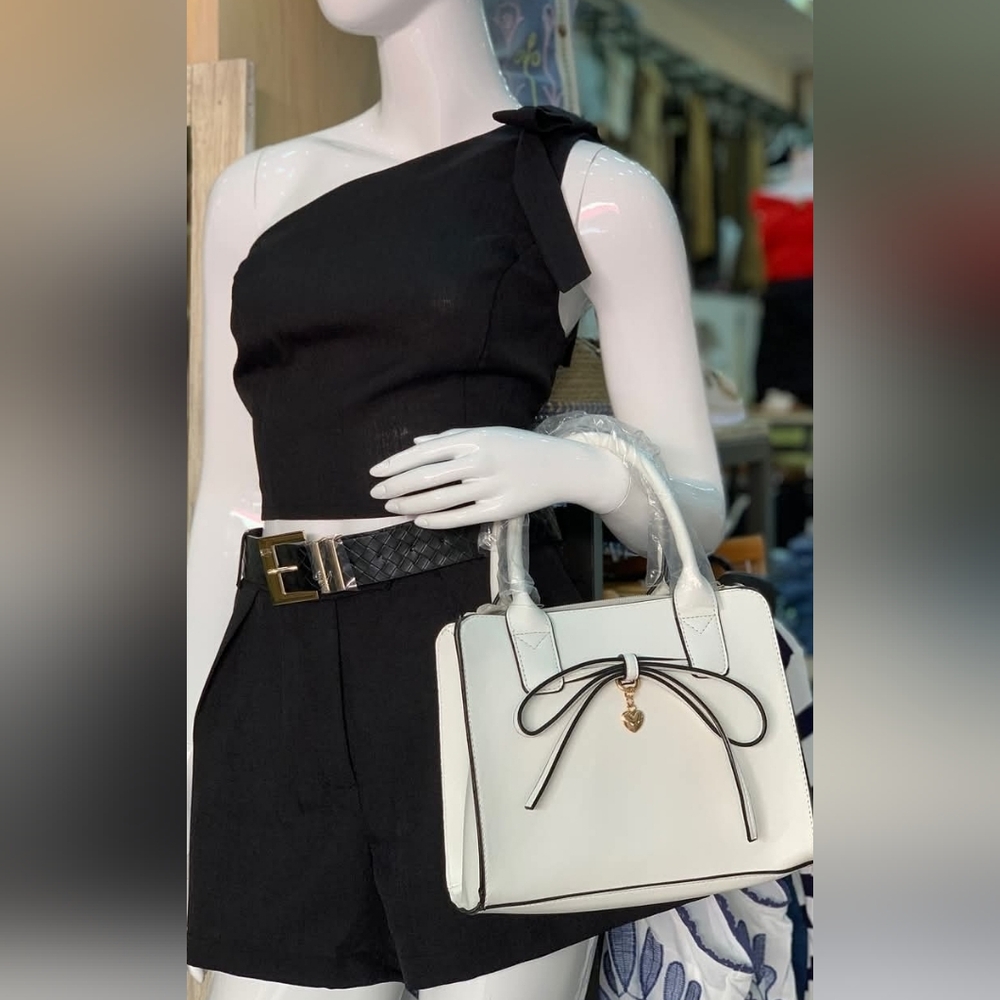 Elegant White Handbag with Black Accents
